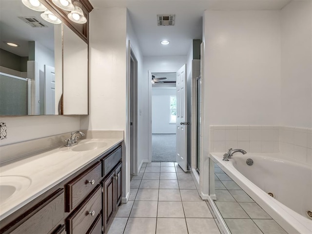 3922 Deer Xing, Edmond, OK 73025 - bathroom with double vanity, tile patterned flooring, a whirlpool tub, and a shower stall