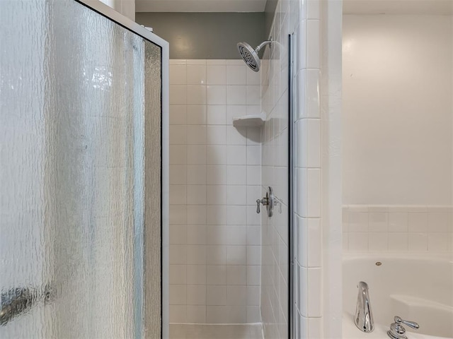 3922 Deer Xing, Edmond, OK 73025 - full bath featuring a stall shower and a bath