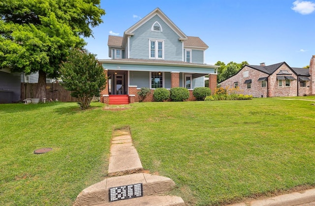811 S Barker Ave, El Reno, OK 73036 - view of front of home with covered porch and brick siding