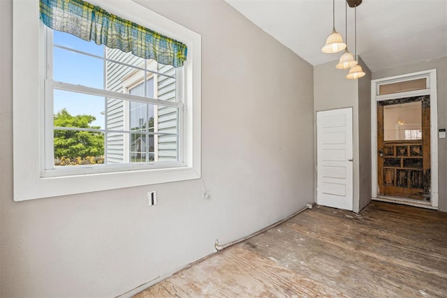 811 S Barker Ave, El Reno, OK 73036 - unfurnished dining area featuring plenty of natural light and wood finished floors