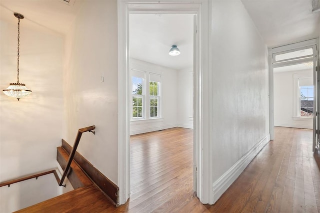 811 S Barker Ave, El Reno, OK 73036 - corridor featuring an upstairs landing and hardwood / wood-style flooring