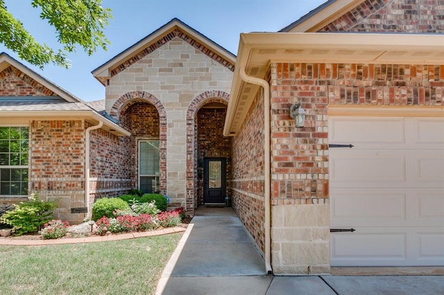 637 Branch Line Rd, Yukon, OK 73099 - doorway to property featuring brick siding and an attached garage
