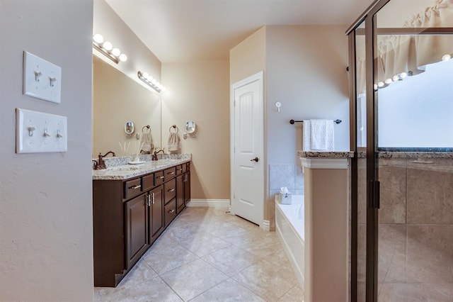 637 Branch Line Rd, Yukon, OK 73099 - full bath with double vanity, a garden tub, and tile patterned flooring