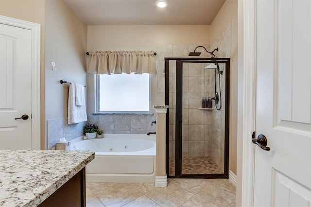 637 Branch Line Rd, Yukon, OK 73099 - bathroom with a jetted tub, a shower stall, tile patterned flooring, and vanity