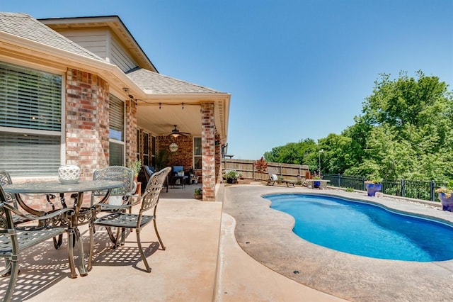 637 Branch Line Rd, Yukon, OK 73099 - view of pool featuring a patio, ceiling fan, a fenced backyard, and outdoor dining space