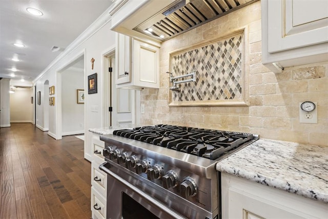 8700 N Waverly Ave, Oklahoma City, OK 73120 - kitchen featuring stainless steel range, custom exhaust hood, tasteful backsplash, light stone countertops, and crown molding