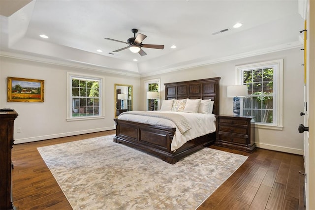8700 N Waverly Ave, Oklahoma City, OK 73120 - bedroom featuring a raised ceiling, dark wood-style floors, recessed lighting, and ceiling fan