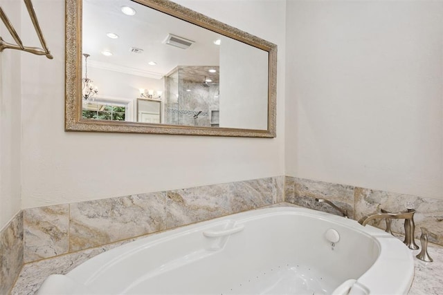 8700 N Waverly Ave, Oklahoma City, OK 73120 - full bathroom featuring a bath, a stall shower, and recessed lighting