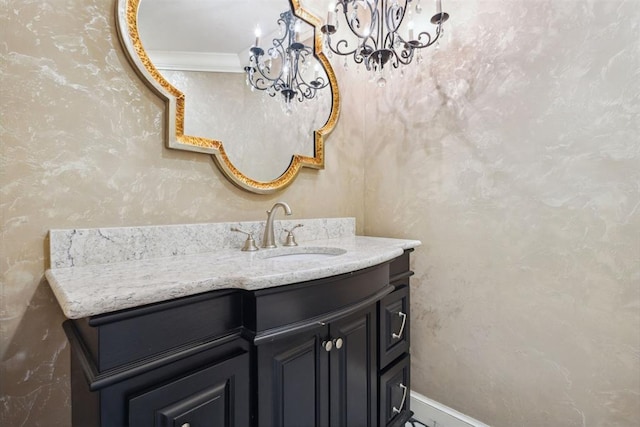 8700 N Waverly Ave, Oklahoma City, OK 73120 - bathroom with a chandelier, vanity, and ornamental molding