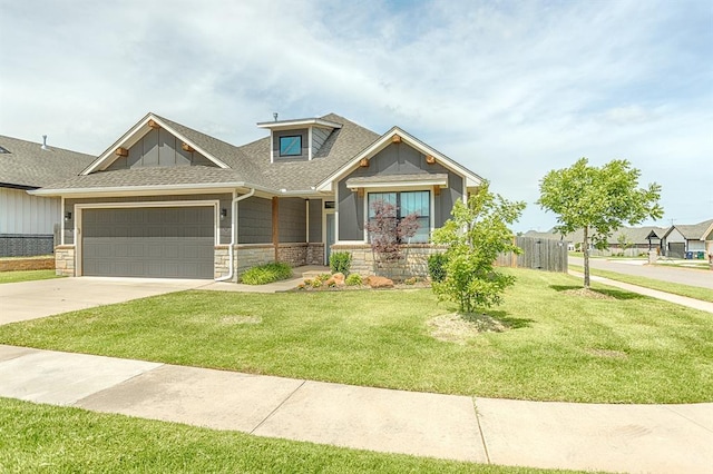 17817 Morning Sky Ct, Edmond, OK 73012 - craftsman-style home with stone siding, driveway, a shingled roof, an attached garage, and board and batten siding