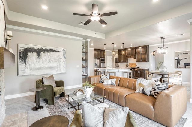 17817 Morning Sky Ct, Edmond, OK 73012 - living room featuring ceiling fan, recessed lighting, and crown molding