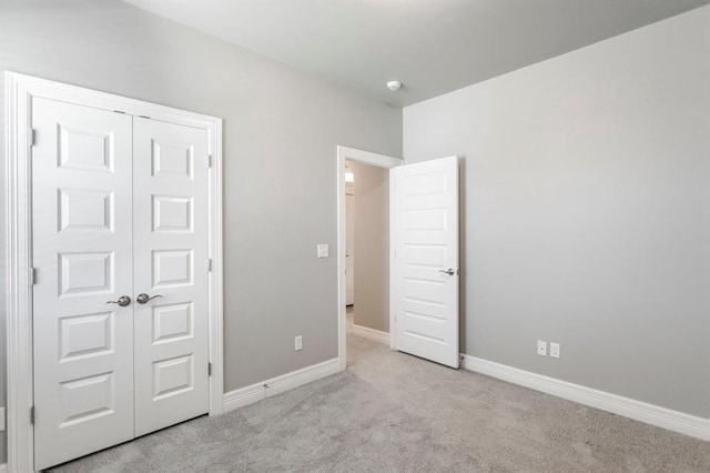 17817 Morning Sky Ct, Edmond, OK 73012 - unfurnished bedroom with carpet flooring and a closet