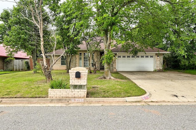 2732 SE 90th St, Moore, OK 73160 - obstructed view of property featuring concrete driveway and a garage