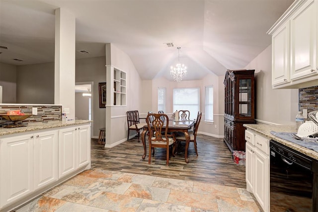 2732 SE 90th St, Moore, OK 73160 - dining area featuring a chandelier, light wood-style flooring, and vaulted ceiling