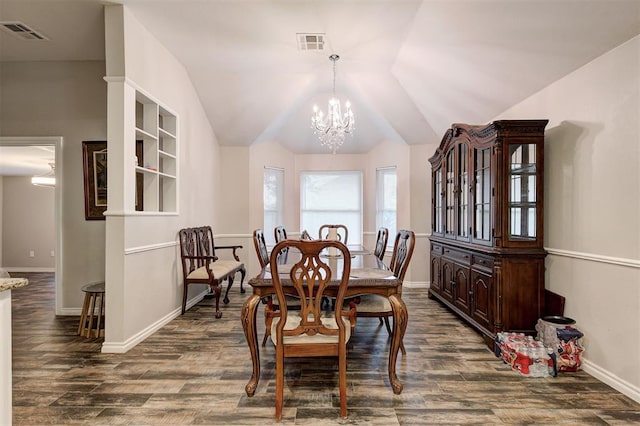 2732 SE 90th St, Moore, OK 73160 - dining space featuring dark wood-style flooring, a chandelier, and vaulted ceiling
