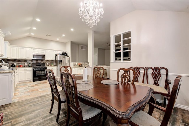 2732 SE 90th St, Moore, OK 73160 - dining area featuring lofted ceiling, light wood-type flooring, recessed lighting, a chandelier, and ceiling fan