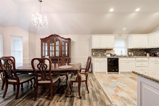 2732 SE 90th St, Moore, OK 73160 - dining area featuring lofted ceiling, a chandelier, and recessed lighting