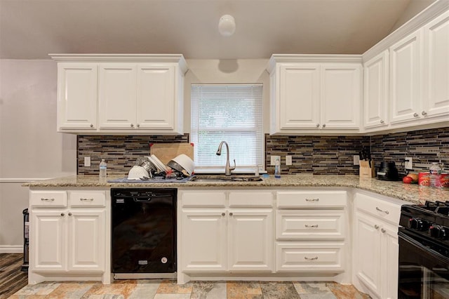 2732 SE 90th St, Moore, OK 73160 - kitchen with black appliances, light stone countertops, decorative backsplash, and white cabinets