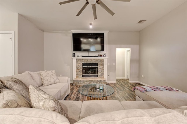 2732 SE 90th St, Moore, OK 73160 - living room with ceiling fan, wood finished floors, and a fireplace