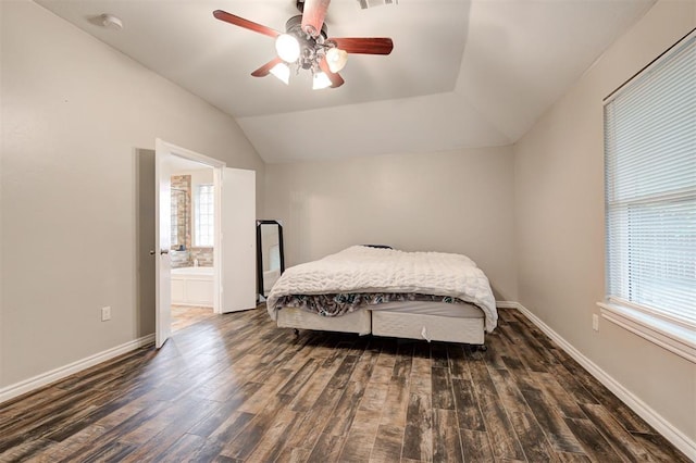 2732 SE 90th St, Moore, OK 73160 - bedroom with wood finished floors, vaulted ceiling, ensuite bathroom, and ceiling fan