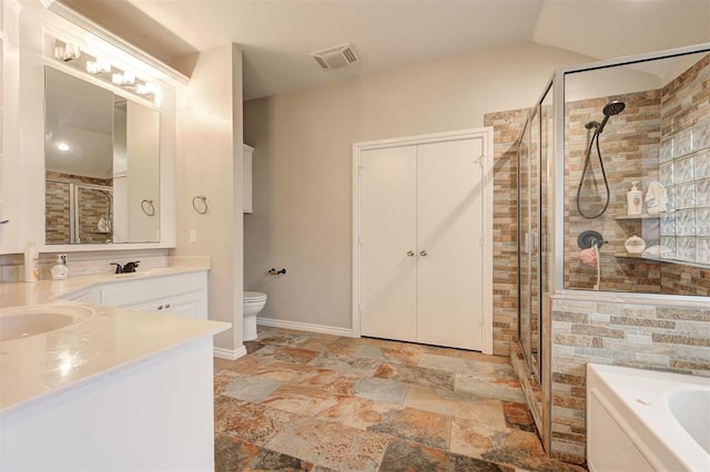 2732 SE 90th St, Moore, OK 73160 - bathroom with a stall shower, vanity, a garden tub, stone finish floors, and lofted ceiling