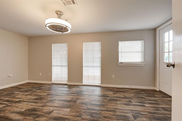 2732 SE 90th St, Moore, OK 73160 - spare room with dark wood-style flooring and baseboards