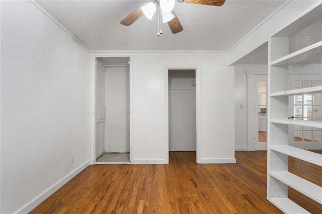 39525 W 151st St, Bristow, OK 74010 - unfurnished bedroom featuring wood finished floors, ceiling fan, and a closet