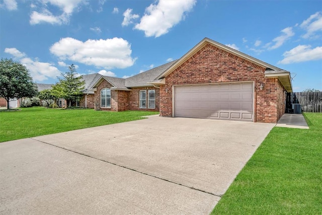 1809 Foxtail Cir, Altus, OK 73521 - single story home with driveway, a garage, brick siding, and a shingled roof