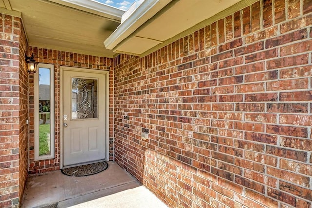 1809 Foxtail Cir, Altus, OK 73521 - doorway to property featuring brick siding