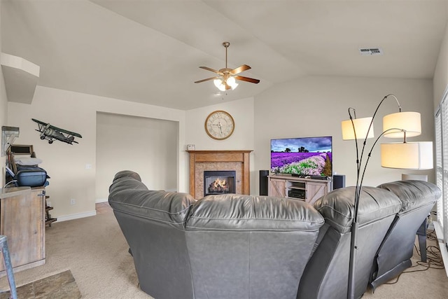 1809 Foxtail Cir, Altus, OK 73521 - living room featuring a ceiling fan, carpet, vaulted ceiling, and a glass covered fireplace