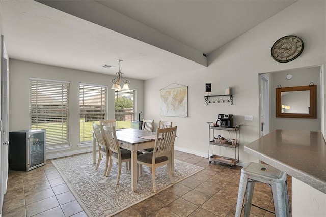 1809 Foxtail Cir, Altus, OK 73521 - dining room featuring baseboards and dark tile patterned floors