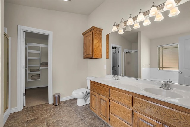 1809 Foxtail Cir, Altus, OK 73521 - bathroom with a stall shower, double vanity, and a spacious closet