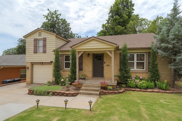 434 NW 48th St, Oklahoma City, OK 73118 - tri-level home featuring brick siding, an attached garage, driveway, a front lawn, and a shingled roof