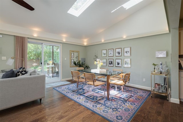 434 NW 48th St, Oklahoma City, OK 73118 - dining space with dark wood finished floors, vaulted ceiling, and a skylight