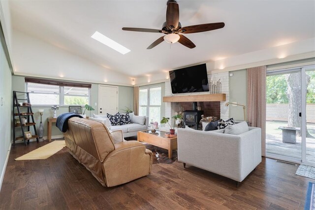 434 NW 48th St, Oklahoma City, OK 73118 - living area featuring a ceiling fan, lofted ceiling, plenty of natural light, and dark wood finished floors