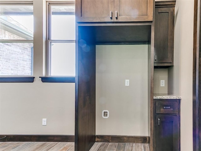 13524 SE 95th St, Oklahoma City, OK 73165 - kitchen featuring wood finished floors and light stone countertops