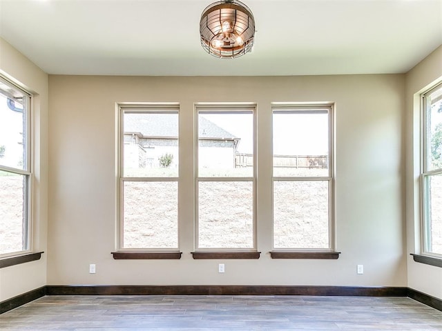 13524 SE 95th St, Oklahoma City, OK 73165 - unfurnished dining area featuring wood finished floors