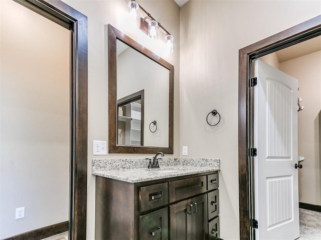 13524 SE 95th St, Oklahoma City, OK 73165 - bathroom with vanity and baseboards