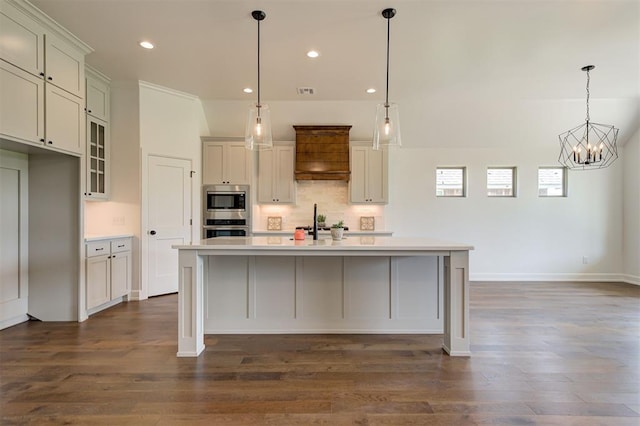 3328 Slate River Dr, Yukon, OK 73099 - kitchen with appliances with stainless steel finishes, a chandelier, light countertops, recessed lighting, and tasteful backsplash