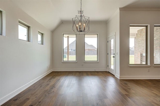 3328 Slate River Dr, Yukon, OK 73099 - unfurnished dining area featuring a chandelier, dark wood-type flooring, ornamental molding, and vaulted ceiling
