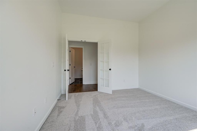 3328 Slate River Dr, Yukon, OK 73099 - empty room with carpet and french doors