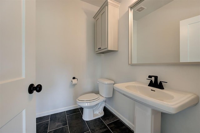 3328 Slate River Dr, Yukon, OK 73099 - half bath with baseboards and tile patterned flooring
