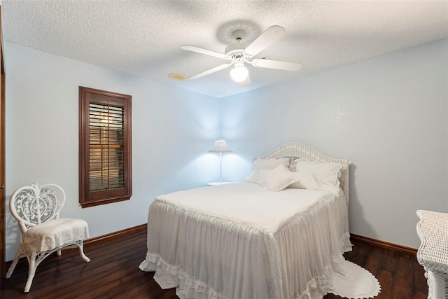 2 Terra Ln, Shawnee, OK 74804 - bedroom with wood finished floors, a textured ceiling, and ceiling fan