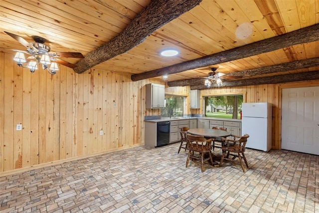 2 Terra Ln, Shawnee, OK 74804 - kitchen featuring freestanding refrigerator, ceiling fan, brick patterned flooring, dishwasher, and wooden walls