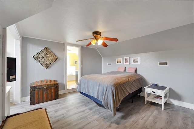 201 S Park Rd, Hobart, OK 73651 - bedroom with wood finished floors, ceiling fan, and lofted ceiling