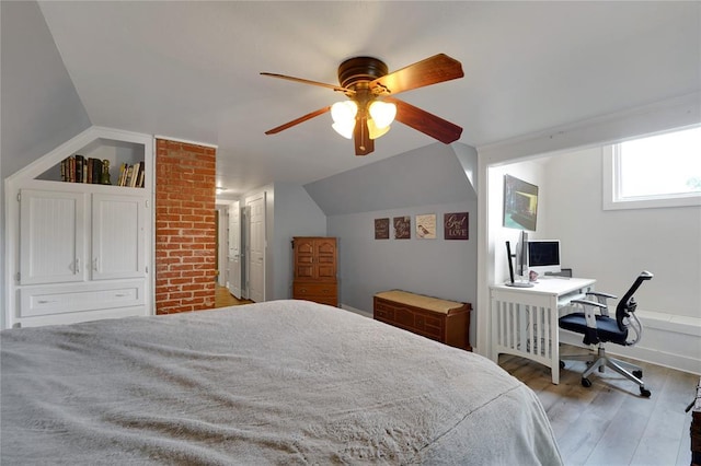 201 S Park Rd, Hobart, OK 73651 - bedroom with wood finished floors, a desk, vaulted ceiling, and ceiling fan