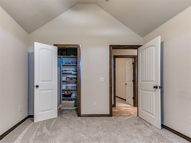 13512 SE 95th St, Oklahoma City, OK 73165 - unfurnished bedroom featuring vaulted ceiling, carpet, and a closet