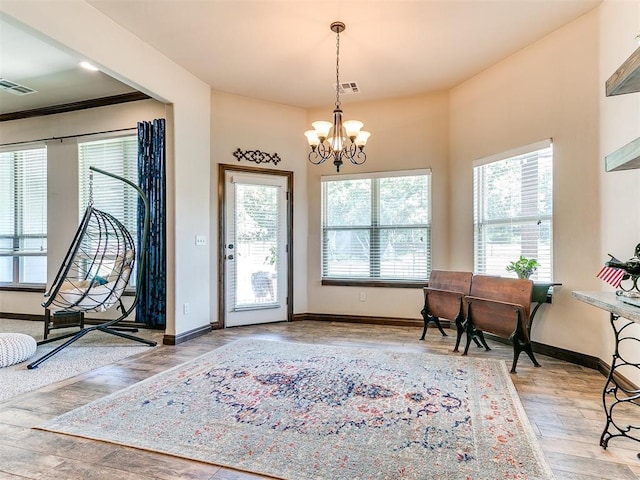 13512 SE 95th St, Oklahoma City, OK 73165 - entrance foyer with a chandelier and wood finished floors