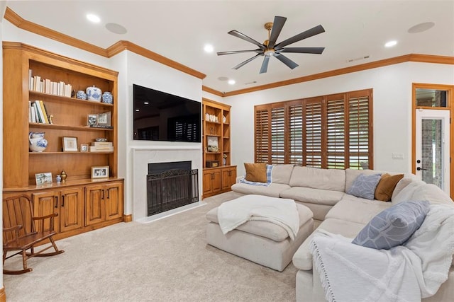 1900 Cobblestone Dr, Shawnee, OK 74804 - living room with ceiling fan, a fireplace, crown molding, carpet, and recessed lighting