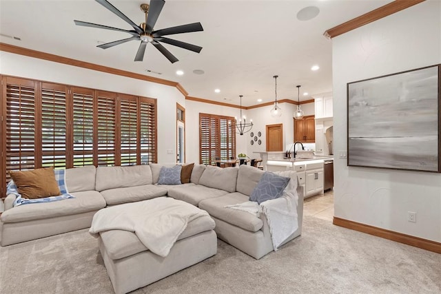 1900 Cobblestone Dr, Shawnee, OK 74804 - living room with a chandelier, a ceiling fan, light carpet, recessed lighting, and crown molding